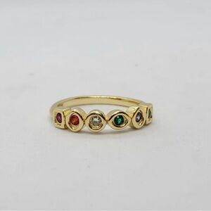 Gold and Red Gemstone Ring with Elegant Design